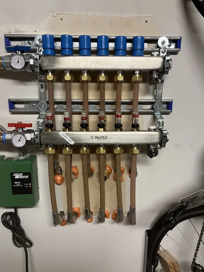 Plumber performing Water Heater Repair at a residential property in Freemansburg